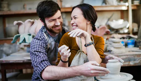 couple at pottery studio