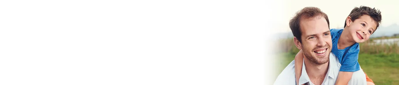 man with small boy behind him