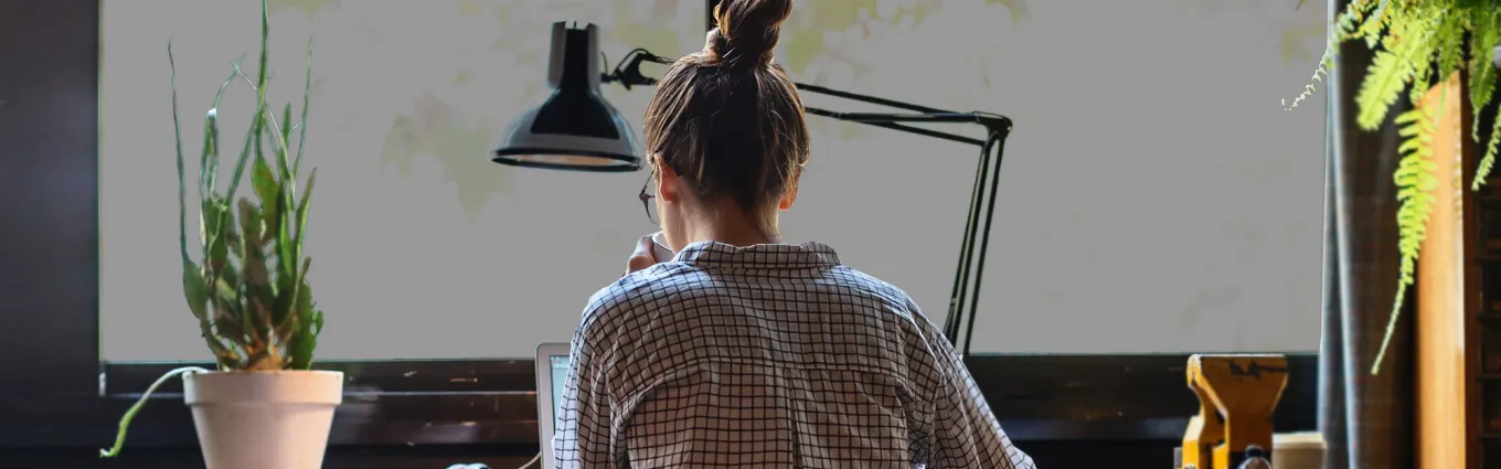 woman sitting at a desk