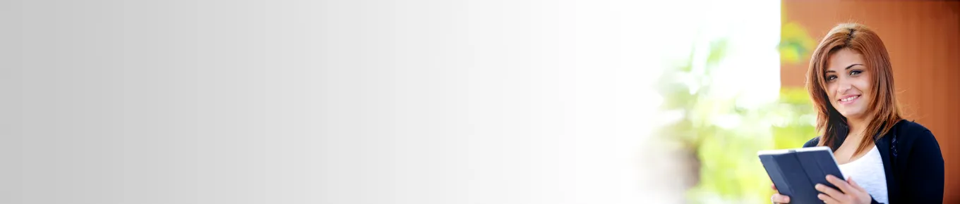 Young woman with brown hair holding a tablet