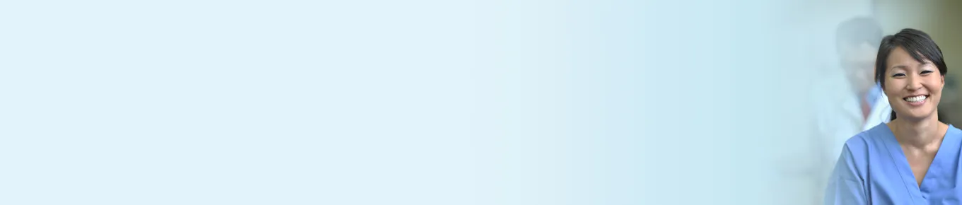 asian woman wearing blue scrubs